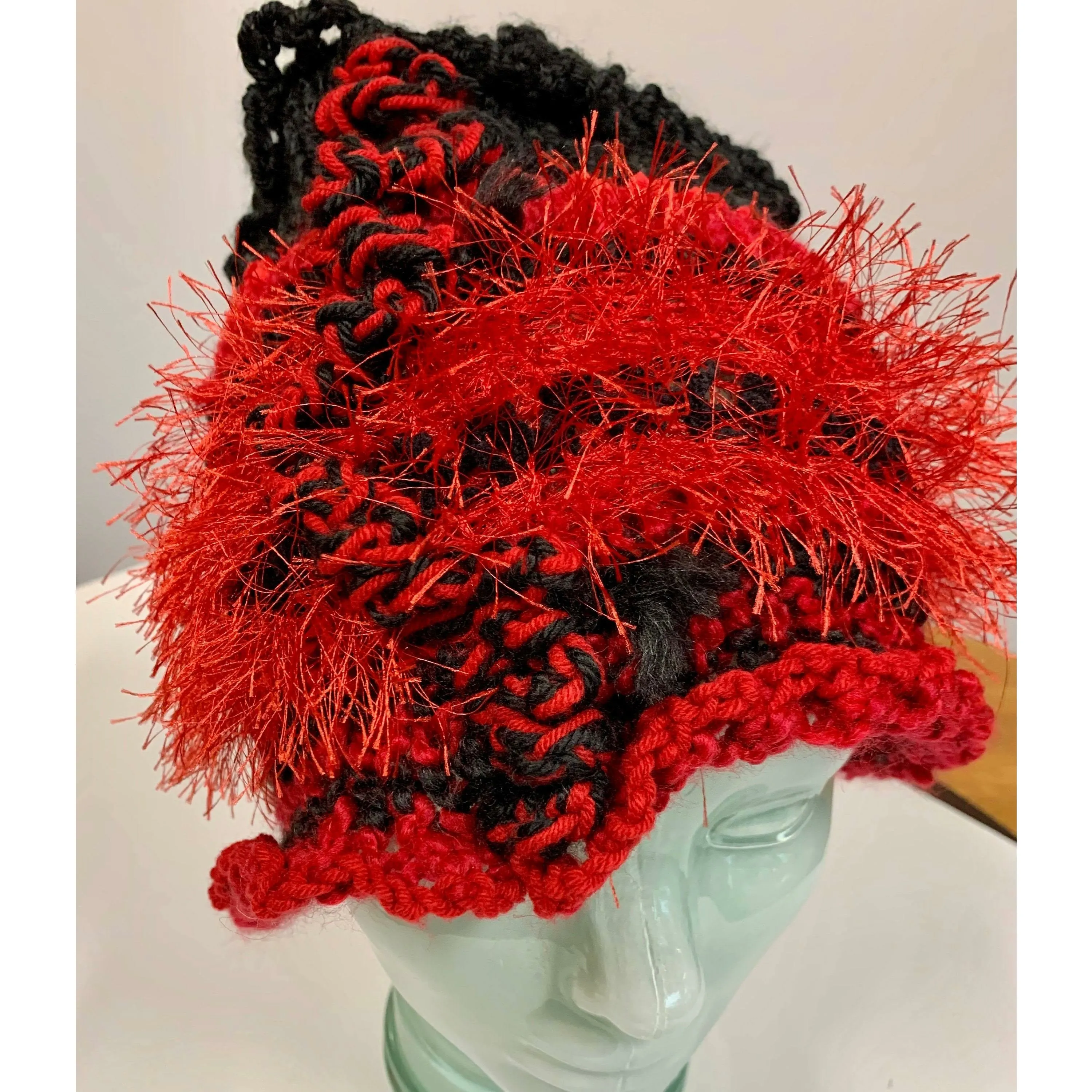 Hand knit shades of Red soft infinity scarf or Head band hat adornment with multiple stitch and color textures. Non wool.