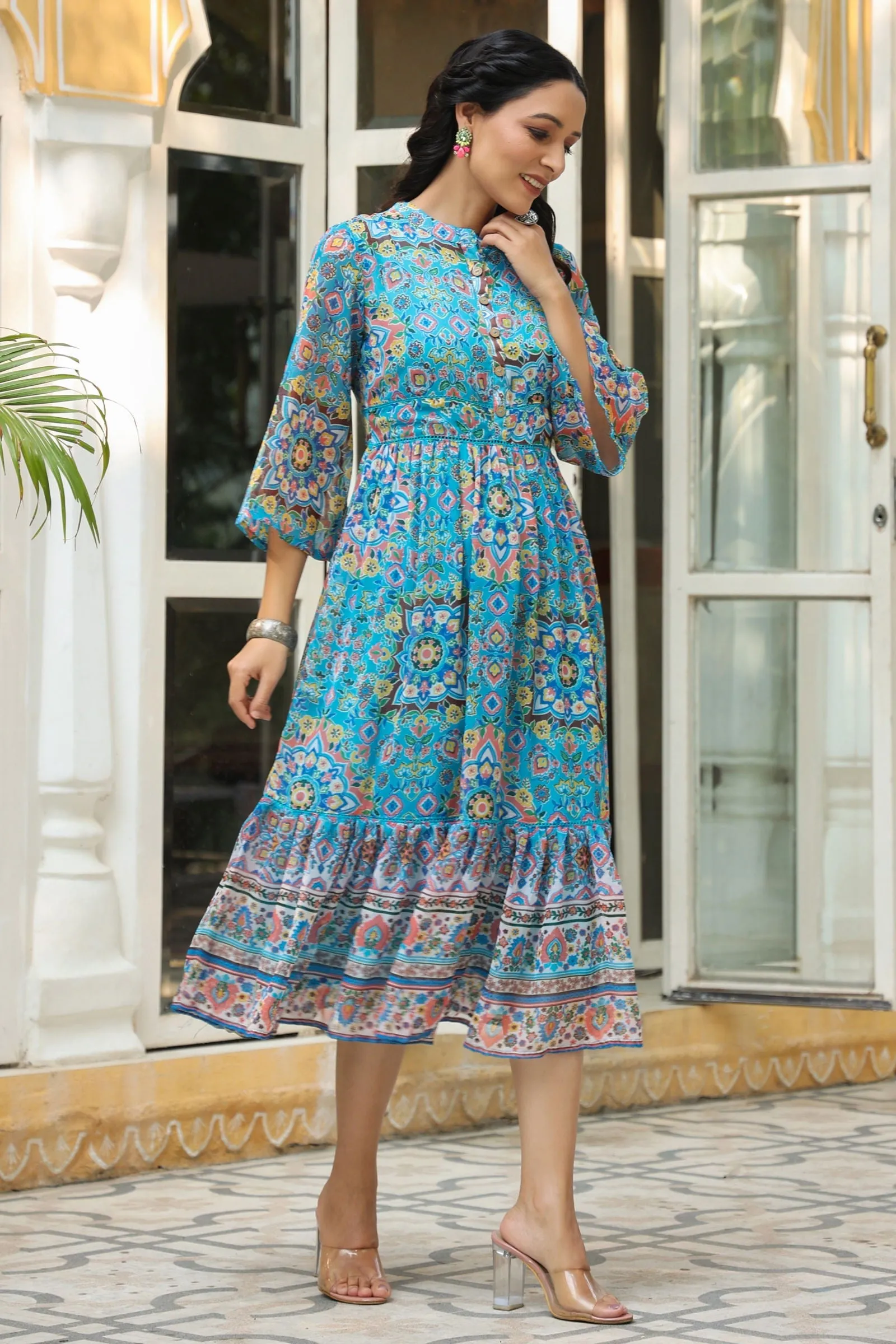 Jashvi Aqua Blue Geometric Printed Chiffon Tiered Maxi Dress With Buttons.