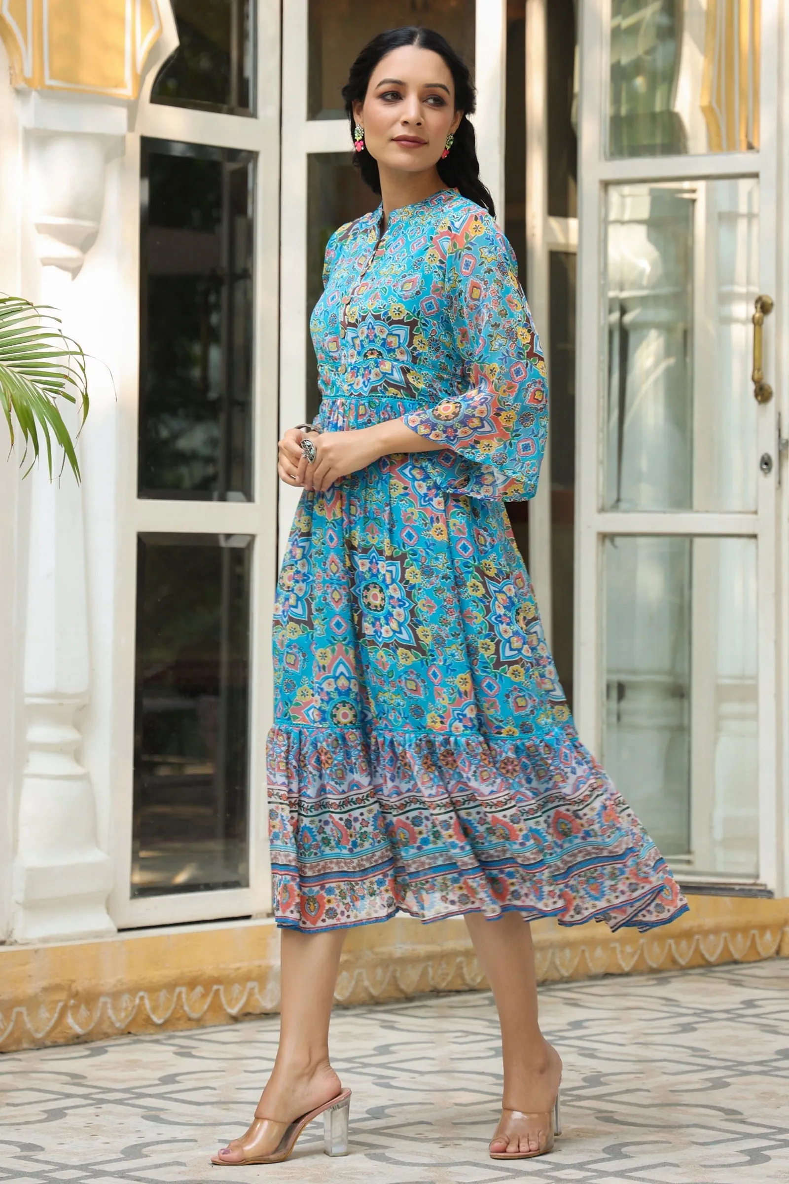 Jashvi Aqua Blue Geometric Printed Chiffon Tiered Maxi Dress With Buttons.