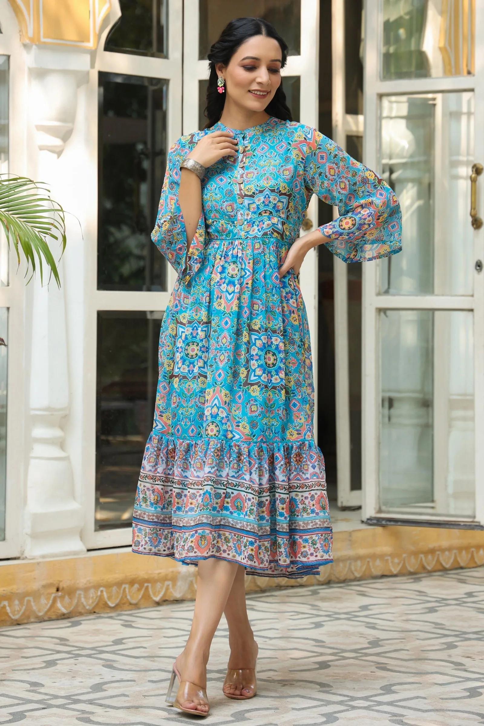 Jashvi Aqua Blue Geometric Printed Chiffon Tiered Maxi Dress With Buttons.