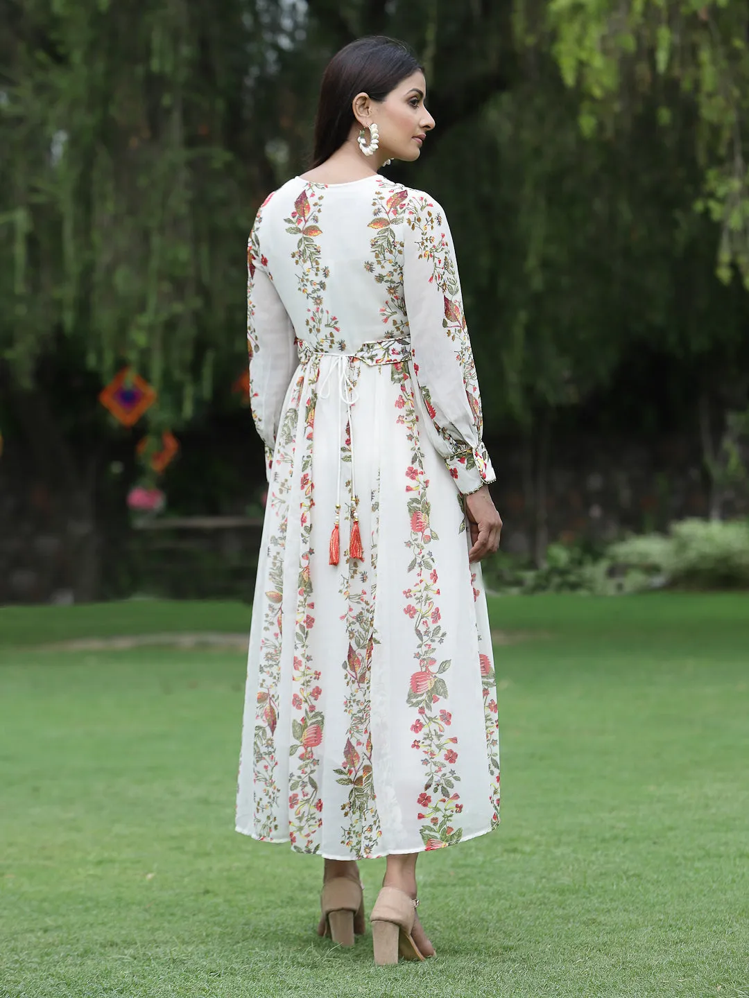 Jashvi Off-White Floral Printed Chiffon Flared Maxi Dress.