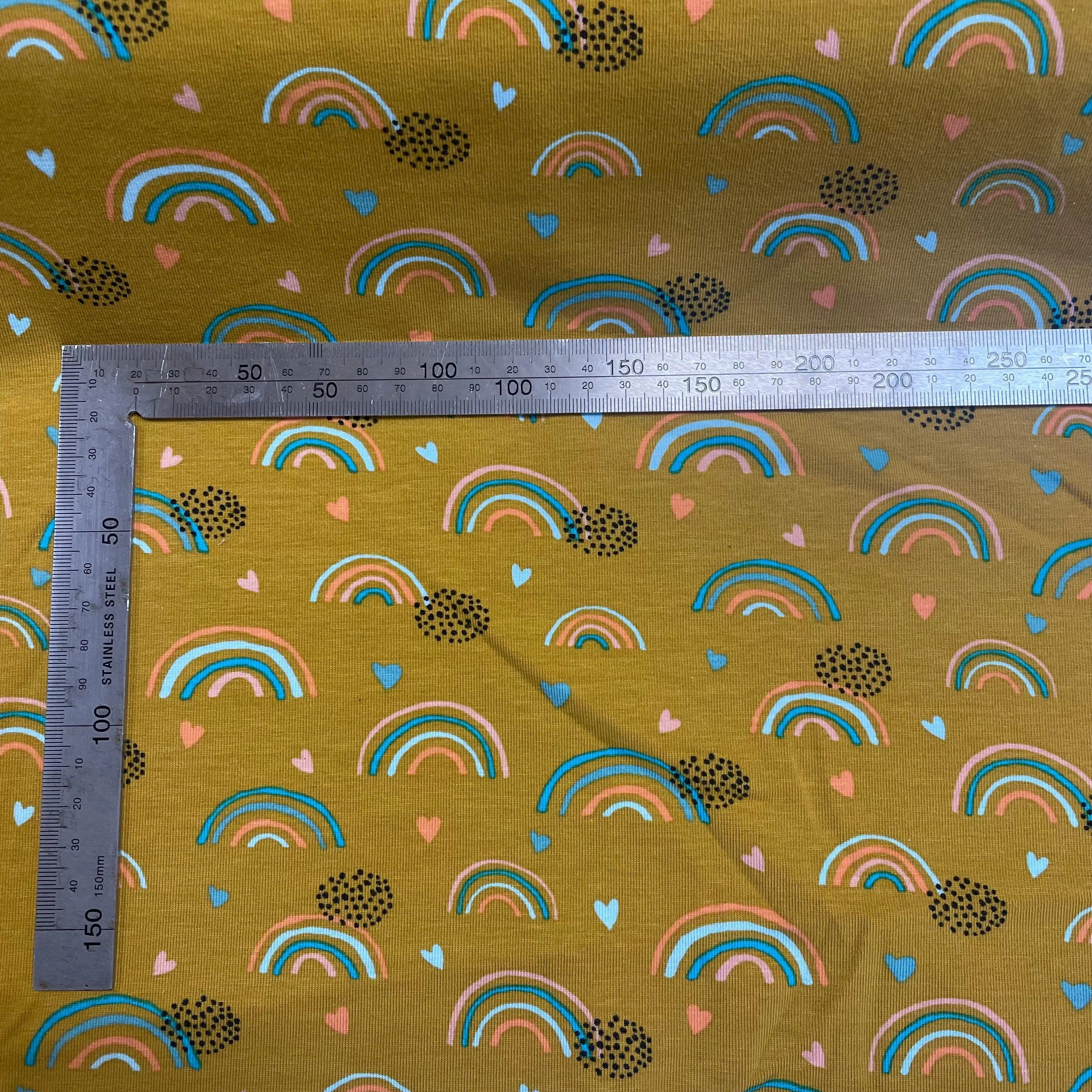 Rainbows on Ocre GOTS Organic Cotton Jersey Fabric